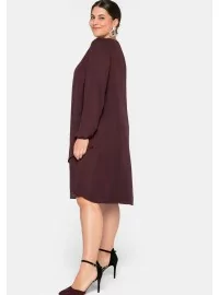 Sluoksniuota varpelio formos Sheego suknelė